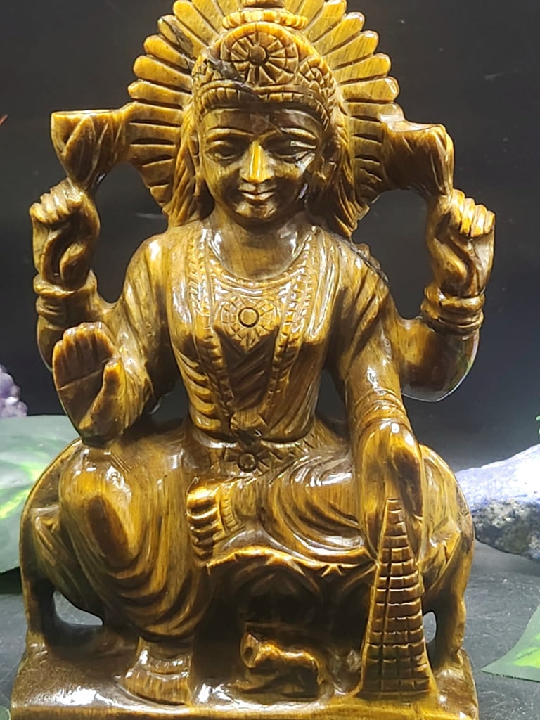 How a Goddess Laxmi Carving in Tiger Eye Gemstone Brings Wealth, Positivity, and Divine Energy