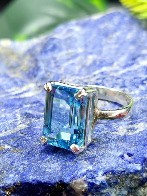 Unlocking the Brilliance - Blue Topaz Faceted Stone Double Barrel Ring in 925 Silver