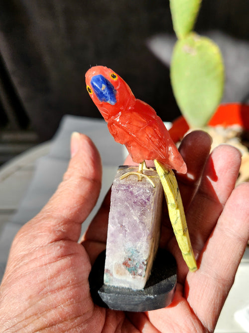 Cherry Quartz, Sodalite, and Serpentine Parrot Carving Sitting on Agate/Amethyst Geode: Vibrant Harmony | Reiki/Chakra/Healing/Energy | Home Decor | Size is 3.5 inches and weight 110 gms