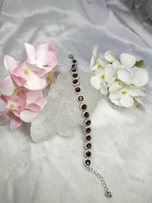 Bracelete in Garnet with CZ embellishments made in 925 silver with rhodium plating
