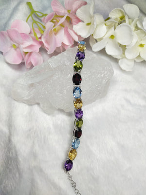 Multi stone bracelete with amethyst, citrine, swiss blue topaz, garnet, peridot made in 925 silver with rhodium plating