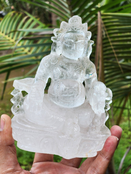 Lord Kuber statue in Clear Quartz Handmade Carving - Kubera Idol | Sculpture in Crystals and Gemstones - 5.5 inches and 810 gms (1.78 lb)
