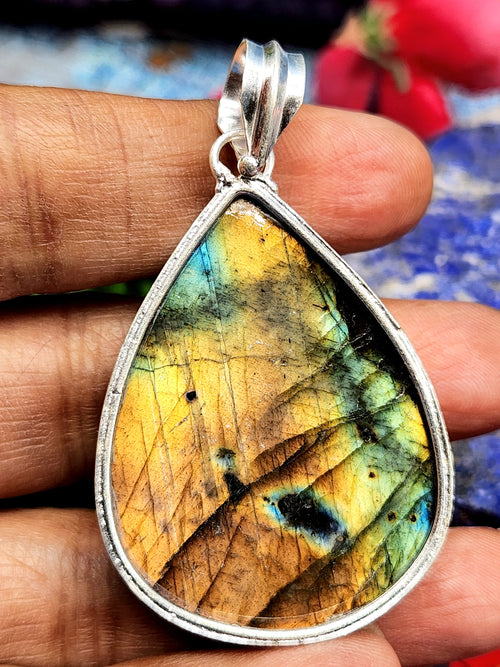 Labradorite Floral Carving Pendant – A Perfect Blend of Beauty, Transformation, and Protection
