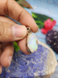 Ethiopian Opal Rough Single Stone Pendant in Silver - A Gemstone Treasure