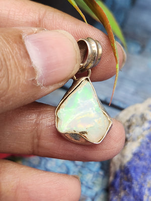 Ethiopian Opal Rough Single Stone Pendant in Silver - Enchanting Opal Brilliance