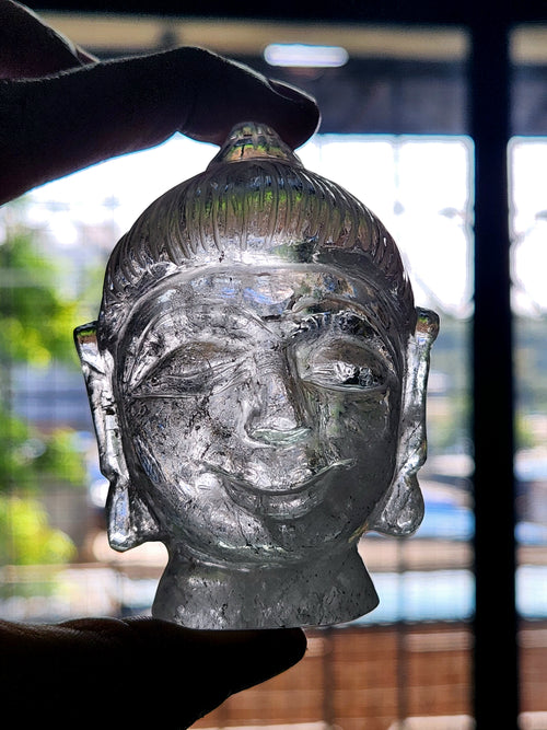 Clear Quartz Buddha Head: A Symbol of Enlightenment and Crystal Clarity
