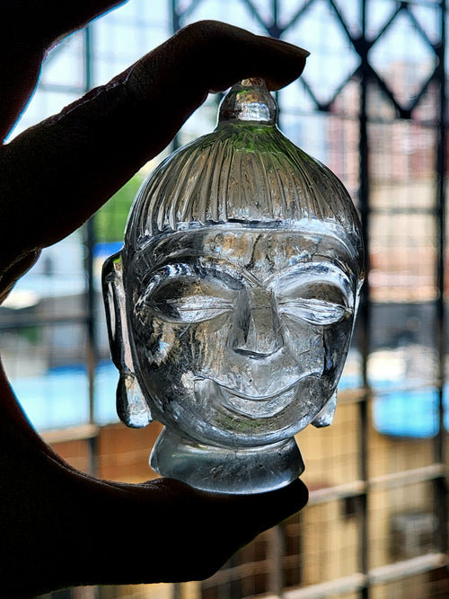 Clear Quartz Buddha Head: A Symbol of Enlightenment and Crystal Clarity