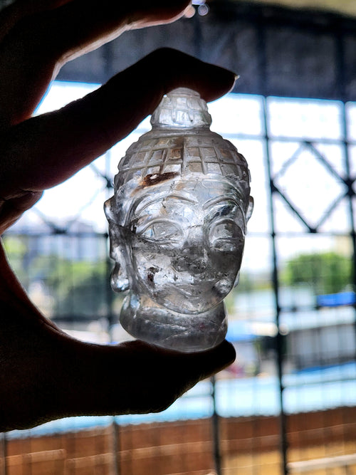 Clear Quartz Buddha Head: Illuminating Paths to Enlightenment