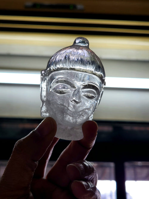Clear Quartz Buddha Head: Meditative Mastery and Spiritual Brilliance