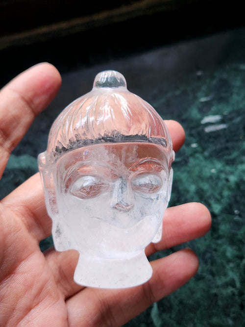 Clear Quartz Buddha Head: Meditative Mastery and Spiritual Brilliance