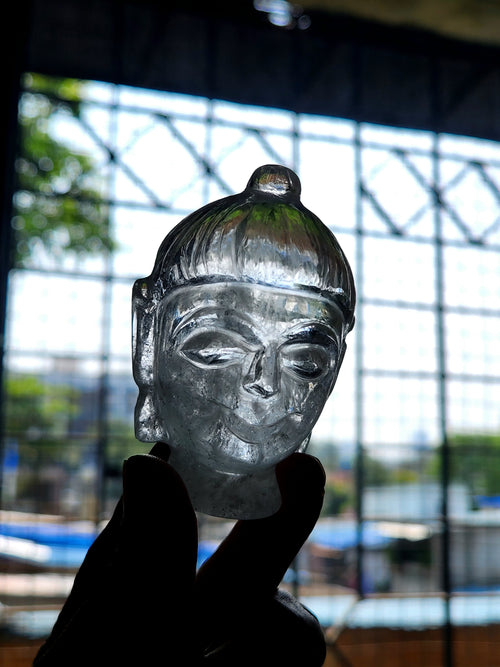 Clear Quartz Buddha Head: Meditative Mastery and Spiritual Brilliance