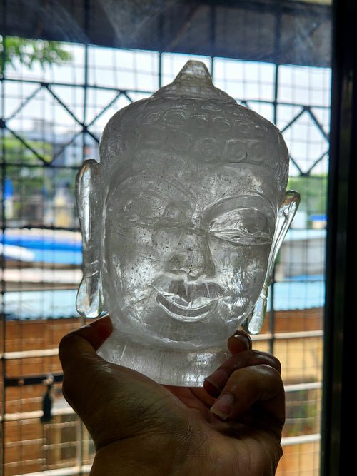 Clear Quartz Buddha Head: Meditative Mastery and Spiritual Brilliance