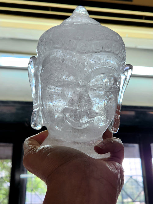 Clear Quartz Buddha Head: Meditative Mastery and Spiritual Brilliance