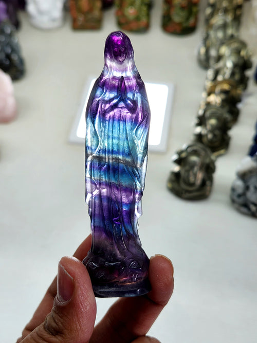 Mother Mary carving in Multi Fluorite - A Radiant Fusion of Faith and Healing