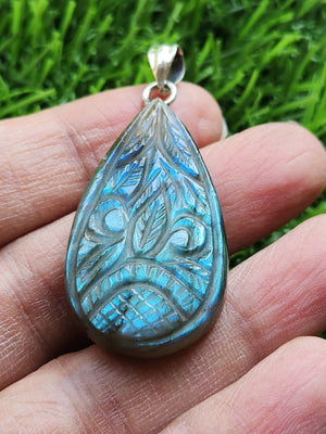 Labradorite Floral Carving Oval Pendant with 925 Silver Loop - A Shimmering Symphony of Nature and Craftsmanship