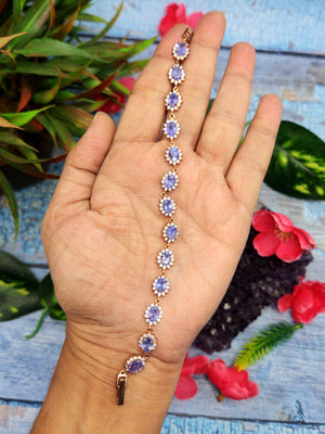 Tanzanite Bracelet in 925 Silver with Pink Gold Rhodium Plating and CZ Embellishments - A Harmonious Symphony of Rarity and Elegance