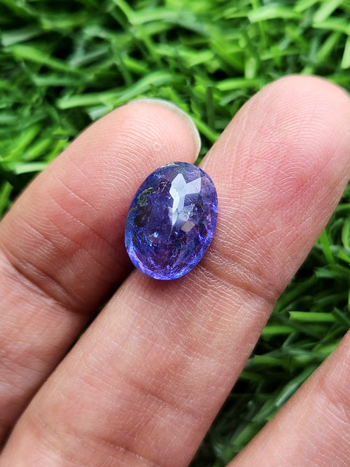 Tanzanite Faceted Oval Shaped Loose Gemstone: Discover the Enchanting Beauty & Healing Power