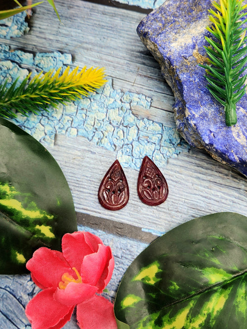 Floral Carved Ruby Stone Pair for Earrings or Pendant - History, Symbolism and Modern Appeal