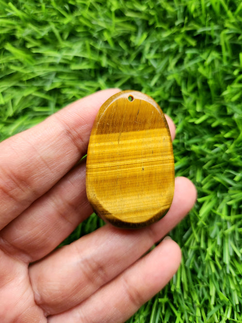 Lord Buddha Carved Pendant in Tiger Eye Stone – A Symbol of Inner Strength, Mindfulness, and Protection | Weight 16 gms