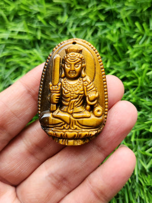 Manjushri Goddess Carved Pendant in Tiger Eye – A Sacred Emblem of Wisdom, Protection and Inner Clarity