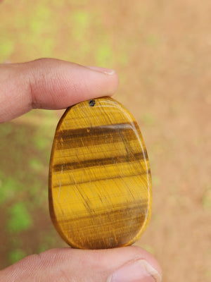 Padmapani Avalokiteshvara Carved Pendant in Tiger Eye – A Sacred Symbol of Compassion, Protection and Inner Peace | Weight 16 gms