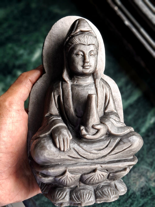 Guan Yin Sitting Carving in Silver Sheen Obsidian – A Symbol of Compassion, Calm & Inner Peace