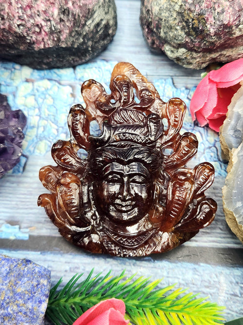 Handmade Lord Shiva Head Carving in Hessonite Garnet Stone - Reverence, Beauty, and Artisan Craftsmanship