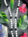 White Moonstone and Black Onyx Bead Mala with Black Onyx Phoenix Pendant - Symbolism and Craftsmanship