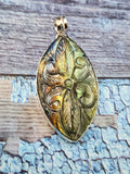 Labradorite Floral Carving Oval Pendant - Unveiling the Ethereal Beauty of Labradorite