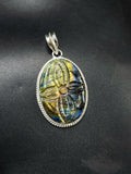 Labradorite Floral Carving Oval Pendant - An Artistic Symphony of Gemstone Elegance