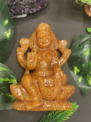 Goddess Lakshmi carving in Yellow Aventurine stone