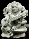 Saraswati carving in howlite stone - Goddess of Learning idol/statue/murti in gemstones and crystals - 3.5 in and 410 gm (0.90 lb)
