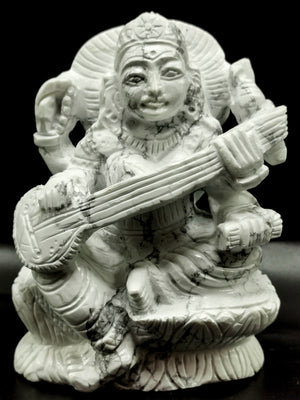 Saraswati carving in howlite stone - Goddess of Learning idol/statue/murti in gemstones and crystals - 3.5 in and 410 gm (0.90 lb)