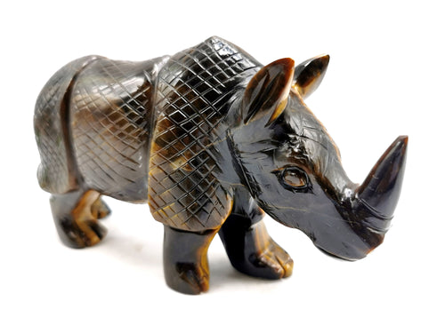Beautifully hand carved rhinoceros carving on natural tiger eye stone - reiki/energy/chakra - 5.5 inches long and 785 gms (1.73 lb)