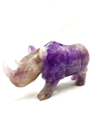 Beautifully hand carved rhinoceros carving on natural amethyst stone - reiki/energy/chakra - 7 inches long and 760 gms (1.67 lb)