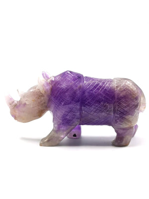 Beautifully hand carved rhinoceros carving on natural amethyst stone - reiki/energy/chakra - 7 inches long and 760 gms (1.67 lb)