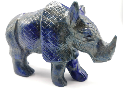 Beautifully hand carved rhinoceros carving on natural lapis lazuli stone - reiki/energy/chakra - 6 inches long and 755 gms (1.66 lb)