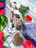 Multiple gemstone beads necklace with ammonite pendant
