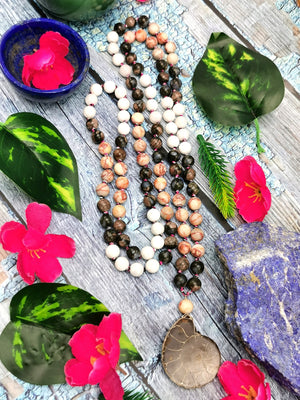 Multiple gemstone beads necklace with ammonite pendant