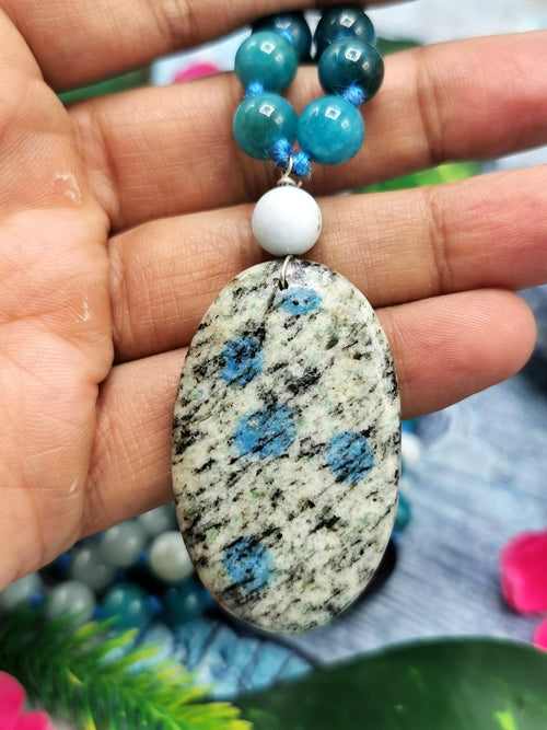 108 bead gemstone necklace with druzy pendant