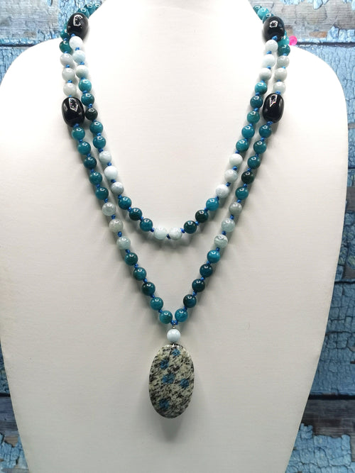 108 bead gemstone necklace with druzy pendant