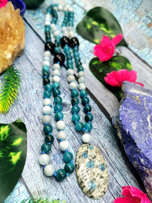 108 bead gemstone necklace with druzy pendant