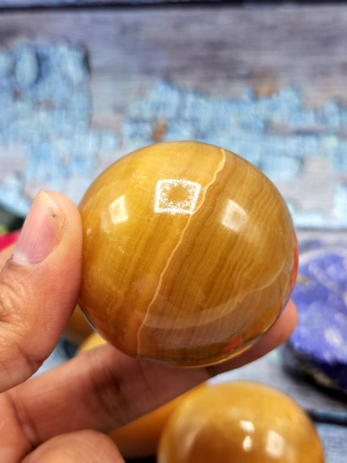 Natural yellow calcite stone sphere/ball - Energy/Reiki/Crystal - 2 inches (5 cms) diameter and 145 gms (0.32 lb) - ONE PIECE ONLY