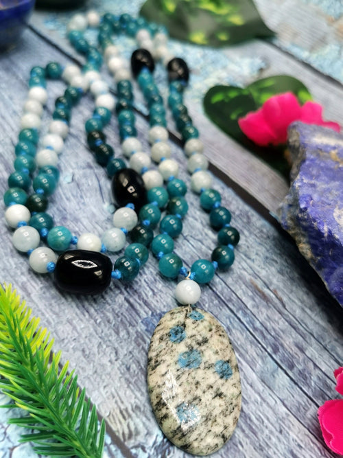 108 bead gemstone necklace with druzy pendant