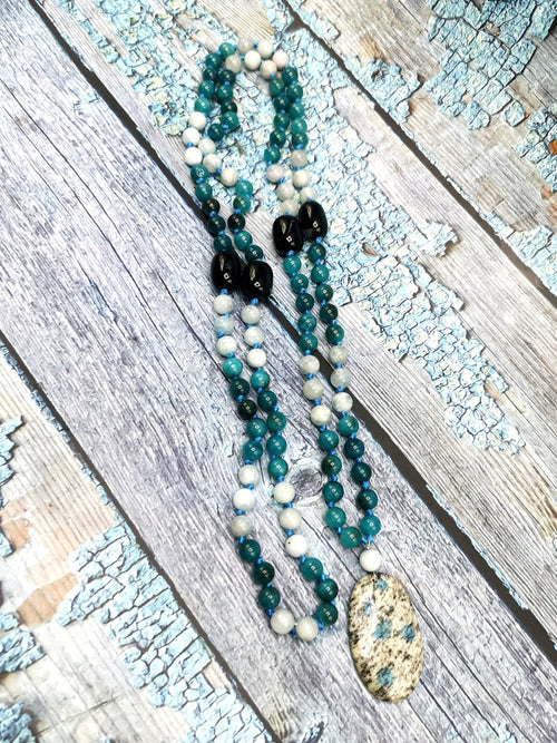 108 bead gemstone necklace with druzy pendant