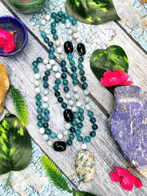 108 bead gemstone necklace with druzy pendant