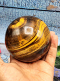 Crystal Healing - Natural golden tiger eye stone sphere/ball - 3.5 inches (8.75 cms) diameter and 880 gms (1.94 lb)