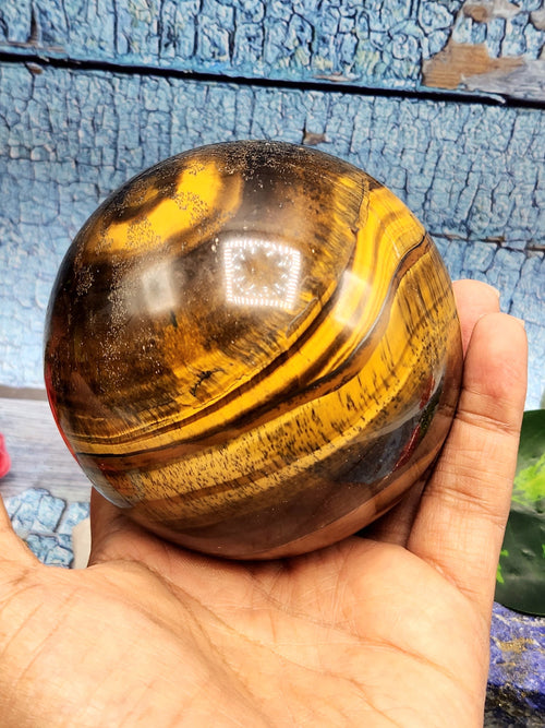 Crystal Healing - Natural golden tiger eye stone sphere/ball - 3.5 inches (8.75 cms) diameter and 880 gms (1.94 lb)