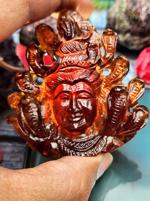 Handmade Lord Shiva Head Carving in Hessonite Garnet Stone - Reverence, Beauty, and Artisan Craftsmanship