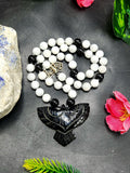 White Moonstone and Black Onyx Bead Mala with Black Onyx Phoenix Pendant - Symbolism and Craftsmanship